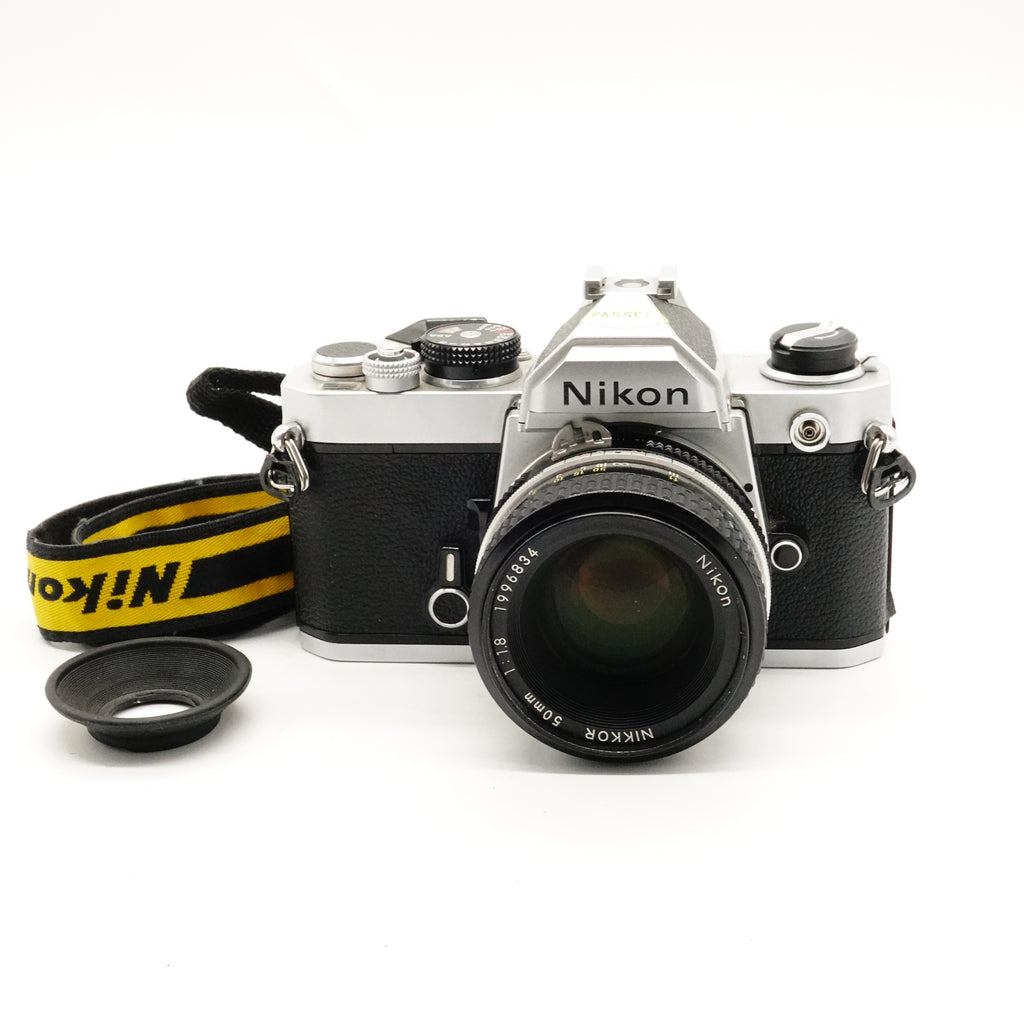 Pre-Owned Nikon FM Film Camera w/50mm f/1.8 Lens, Strap, Caps SN: 2294977 (Second Hand)