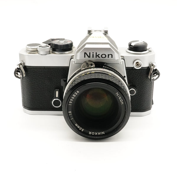 Pre-Owned Nikon FM Film Camera w/50mm f/1.8 Lens, Strap, Caps SN: 2294977 (Second Hand)
