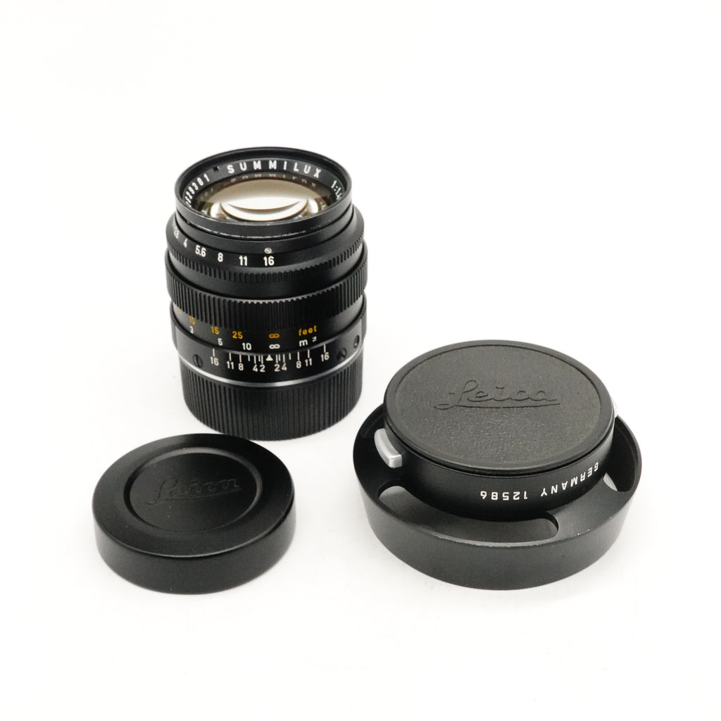 Pre-Owned Leica M 50mm f/1.4 Ver. II  Model 11114 Summilux Lens Black Year 1973 With Filter, F&R Caps, 12586 hood with cap SN: 2629381 (Second Hand)