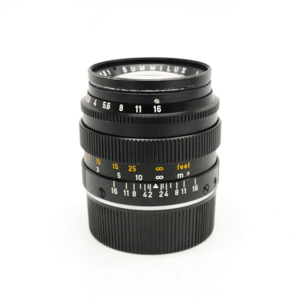 Pre-Owned Leica M 50mm f/1.4 Ver. II  Model 11114 Summilux Lens Black Year 1973 With Filter, F&R Caps, 12586 hood with cap SN: 2629381 (Second Hand)