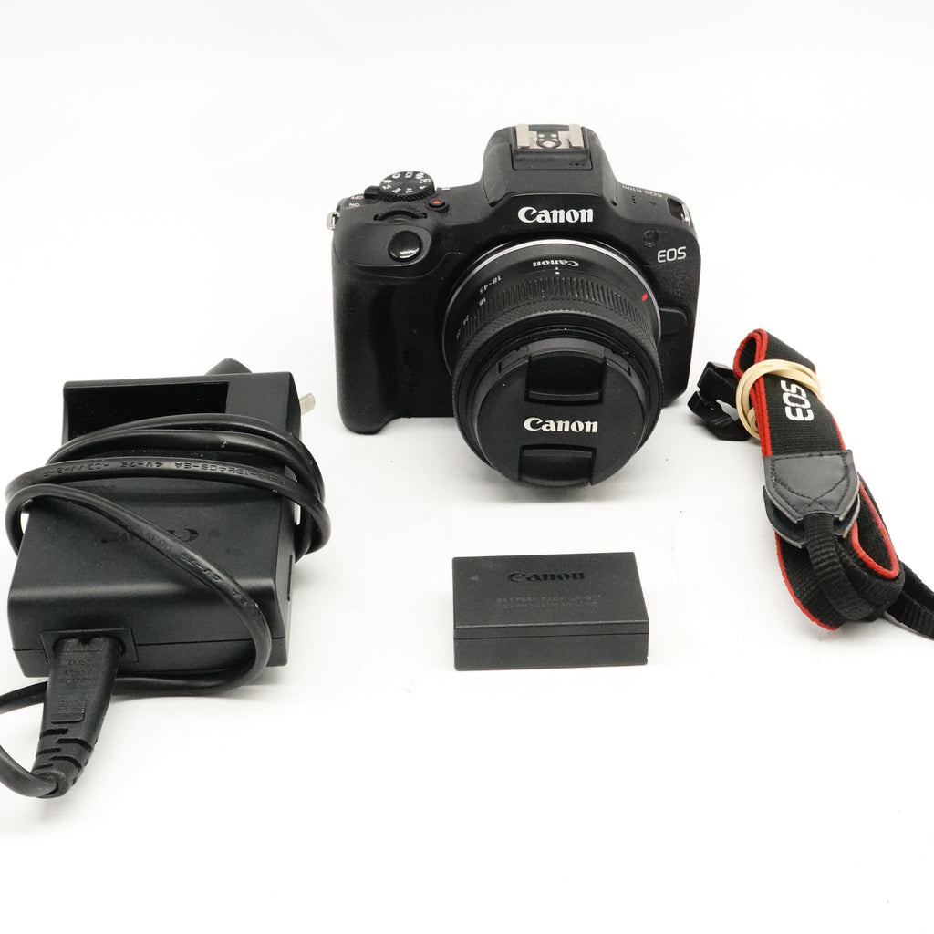 Pre-Owned Canon EOS R100 Kit, 18-45mm f4.5-6.3 Lens With Strap, Battery, Charger & Front Lens Cap SN: 3112019879/076031004619 (Second Hand)