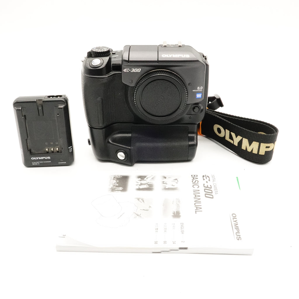 Pre-Owned Olympus  E-300 4/3 Dslr Camera With Strap, Manual and Charger (No Battery) SN: 627507924 (Second Hand)