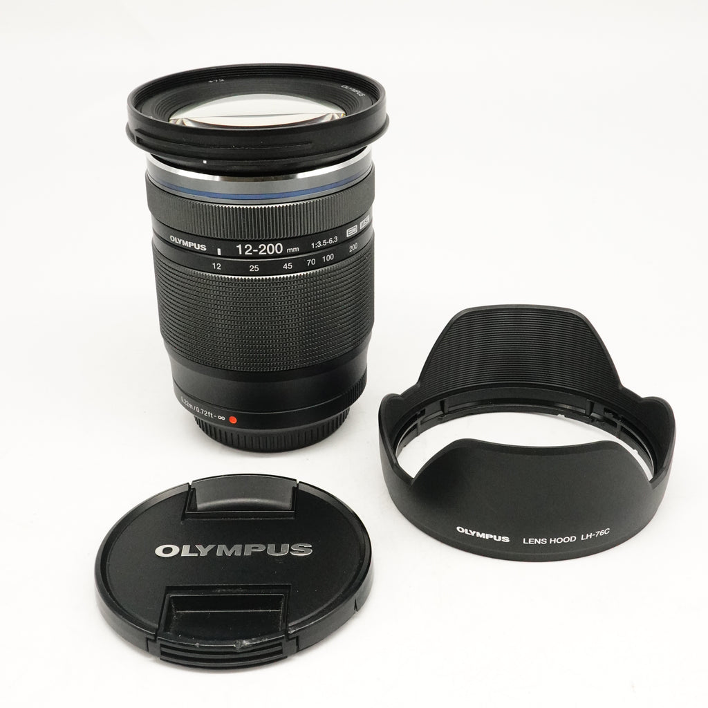 Pre-Owned OM System M.ZUIKO 12-200mm F3.5-6.3 Black lens With F&R Caps, Hood SN: 350013148 (Second Hand)