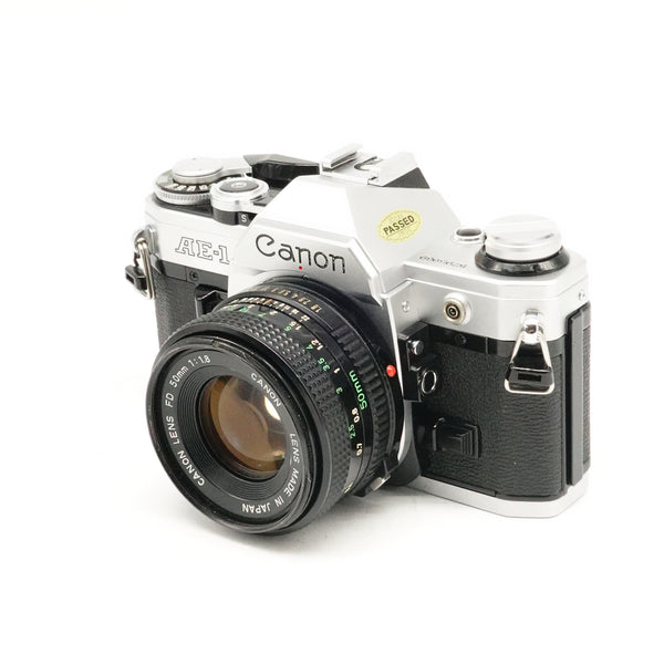 Pre-Owned Canon AE-1 Camera + Canon FD 50mm f/1.8 Lens with Front Cap SN: 5795969 + 1870829 (Second Hand)