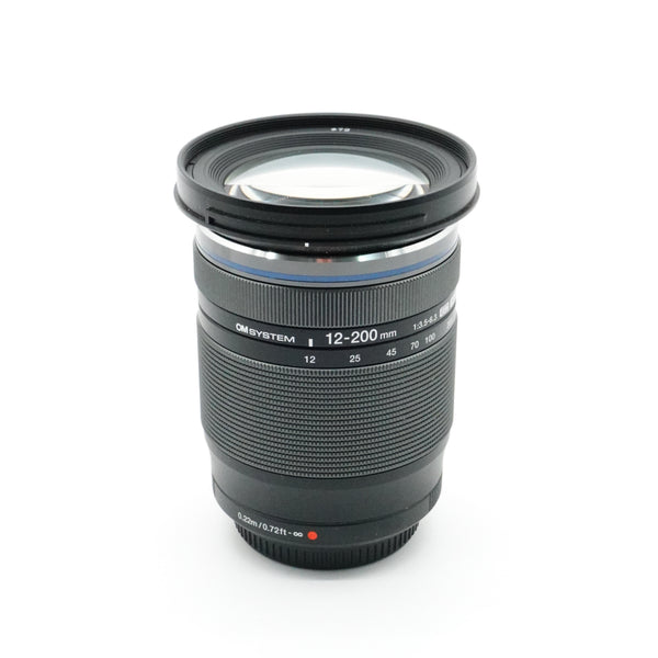 Pre-Owned OM System M. ZUIKO Digital 12-200mm f/3.5-6.3 ED MSC Lens With Caps & Hood SN: 350022589 (Second Hand)
