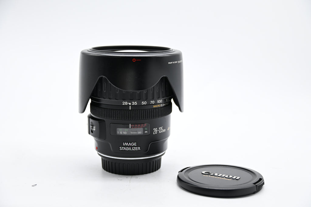 Pre-owned Canon EF 28-135mm f/3.5-5.6 IS USM Lens w/caps & Hood SN: 83002382