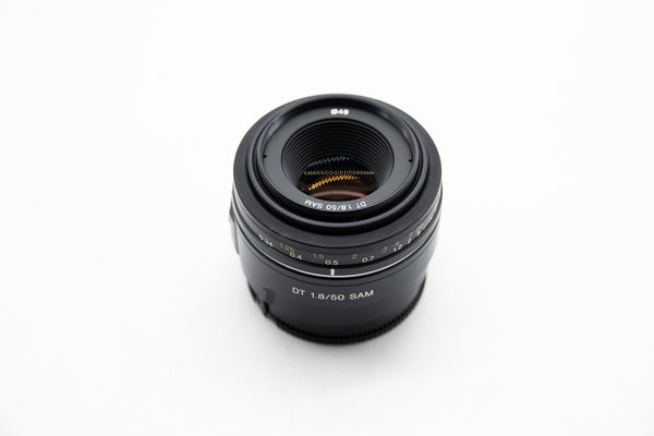 Pre Owned Sony SAL 50mm f1.8 DT SAM OSS Lens W/ F,R Caps SN: 1957112