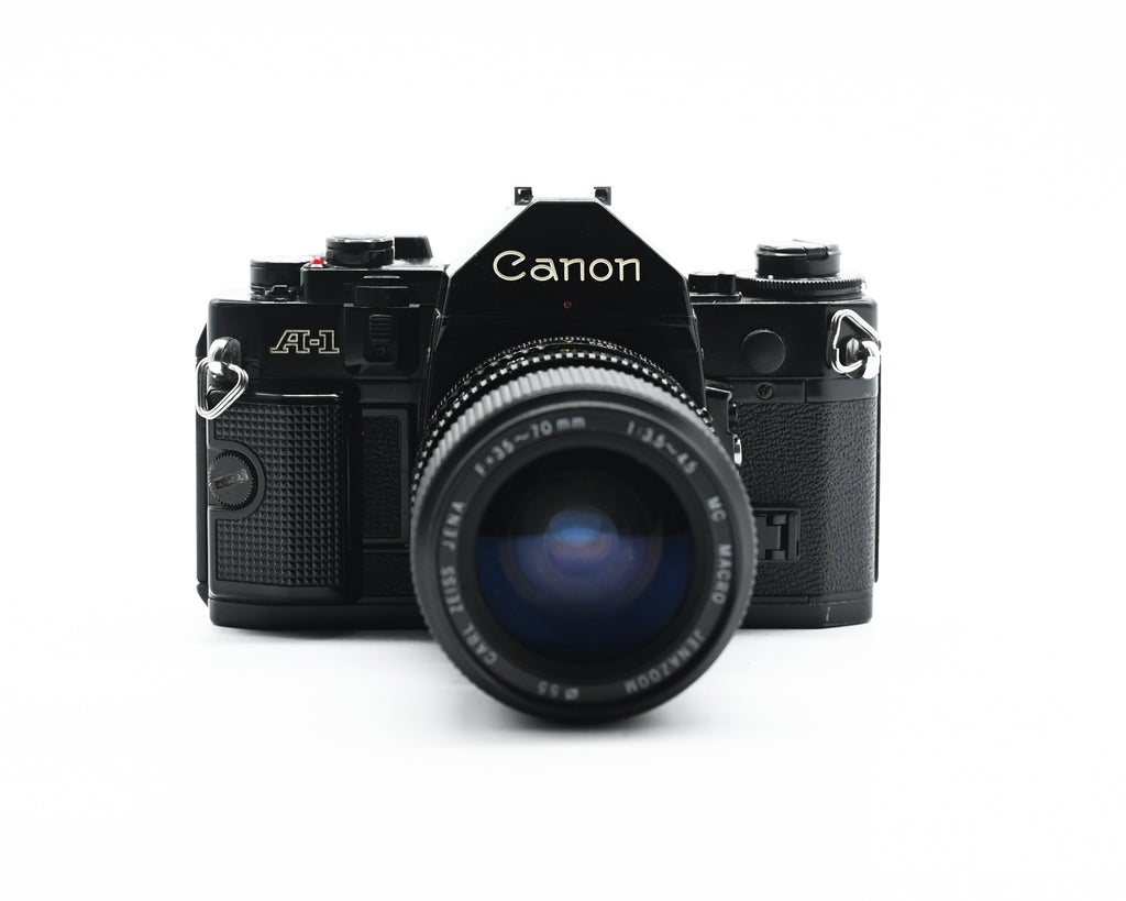 Canon A-1 + 35-70mm f/3.5 Carl Zeiss Jena lens w/Caps 2120392 (Second Hand)